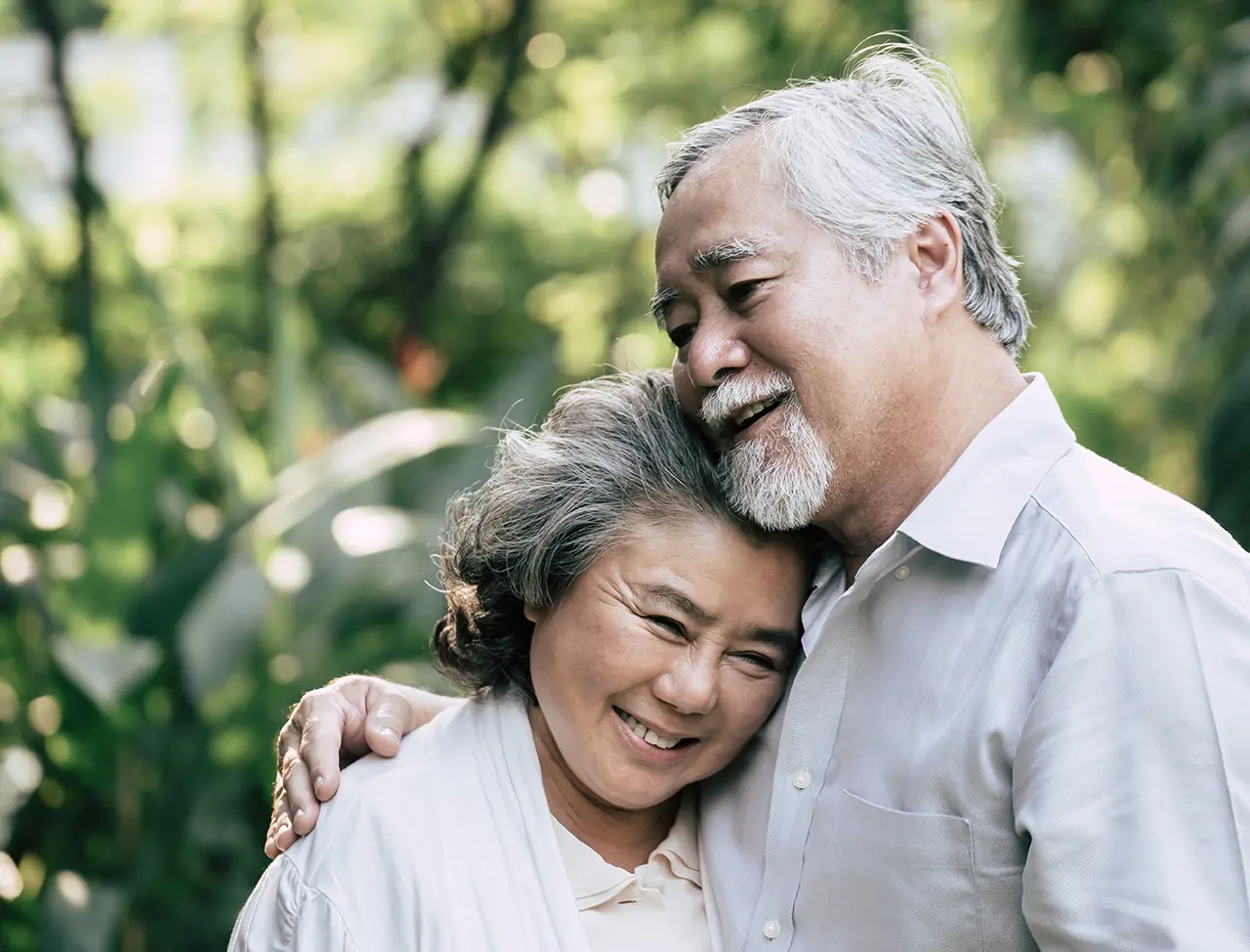 Elderly couple embracing